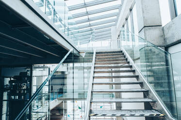 Colorful interior of a modern spacious library or office building with staircase. - HPIF24451