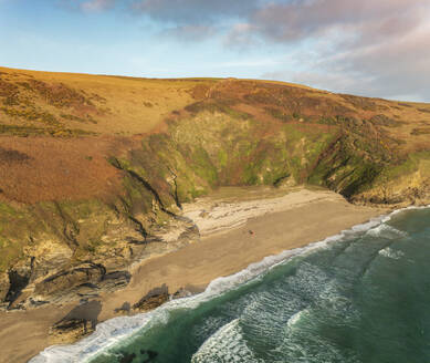 Aerial view of Lantic Bay, secret coves and walks at sunset, Polruan, Cornwall, United Kingdom. - AAEF18196