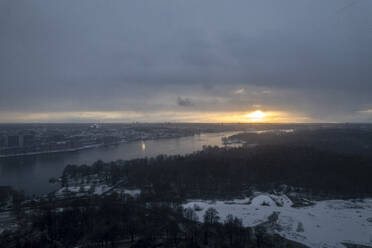 Aerial view of Hundudden harbor in winter at sunset, Djurgardsbrunn, Stockholm, Sweden. - AAEF18204