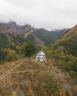 Aerial view of Tabayama Roller Slide pagoda during koyo season, Tokyo, Japan. - AAEF18223