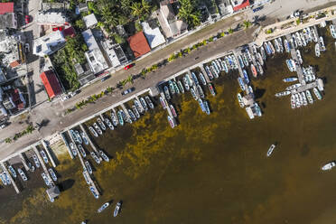 Aerial view of boats docked at the pier along the coast in Rio Lagartos, Yucatan, Mexico. - AAEF18257
