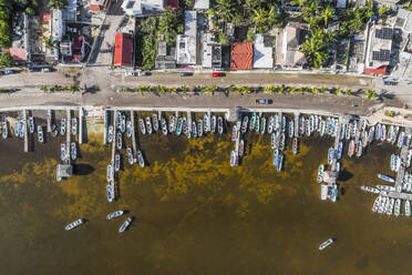 Aerial view of boats docked at the pier along the coast in Rio Lagartos, Yucatan, Mexico. - AAEF18258