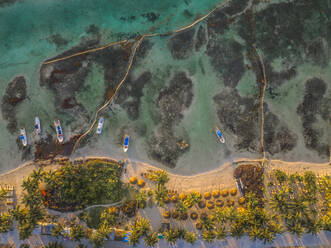 Aerial view of boats moored along the coast on the beach in Mahahual, a small town along the coastline, Quintana Roo, Mexico. - AAEF18290