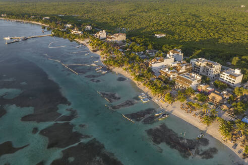 Aerial view of boats moored along the coast on the beach in Mahahual, a small town along the coastline, Quintana Roo, Mexico. - AAEF18293