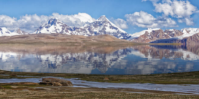 Pik Dankova peak reflecting in water, Tian Shan mountains at the Chinese border, Naryn province, Kyrgyzstan, Central Asia, Asia - RHPLF24163