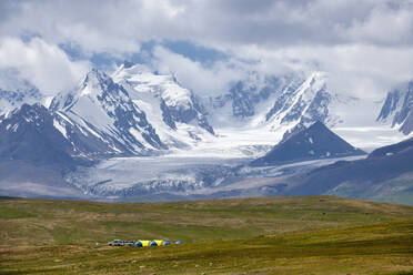 Camp at the base of Kizil-Asker glacier, Kakshaal Too in the Tian Shan mountain range near the Chinese border, Naryn Region, Kyrgyzstan, Central Asia, Asia - RHPLF24164