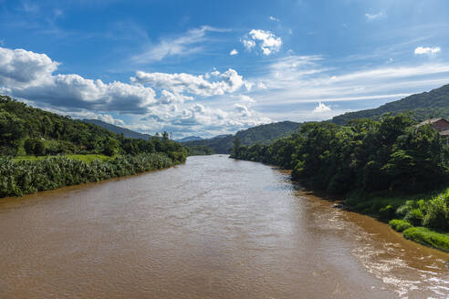Iguape River flowing through Iporanga, Sao Paulo State, Brazil, South America - RHPLF24263