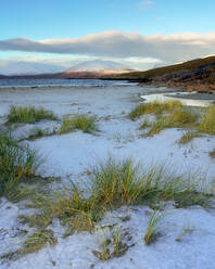 Luskentyre Beach on a snow covered winter's morning, Isle of Harris, Outer Hebrides, Scotland, United Kingdom, Europe - RHPLF24319