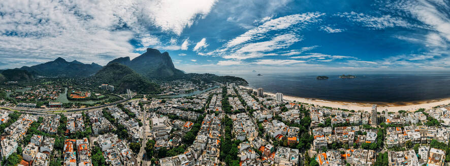 Aerial panoramic view of Pepe Beach and Pedra da Gavea in Barra da Tijuca district, an upscale neighborhood on the west side of Rio de Janeiro, Brazil, South Amereica - RHPLF24338