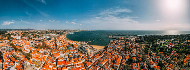 Aerial drone panoramic view of Cascais historic centre with the iconic Bay and Ribeira Beach, 30km west of Lisbon on the Portuguese Riviera, Cascais, Portugal, Europe - RHPLF24341