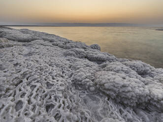 Dry salt incrustations on the shores of the Dead Sea, at dusk, Jordan, Middle East - RHPLF24389
