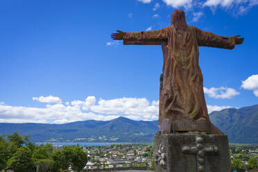 Wooden statue of Christ, Mirador El Cristo, Pucon, Chile, South America - RHPLF24436