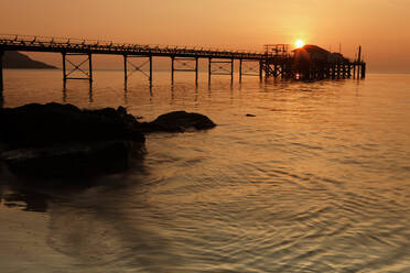Sunset over Totland Pier, Isle of Wight, England, United Kingdom, Europe - RHPLF24575