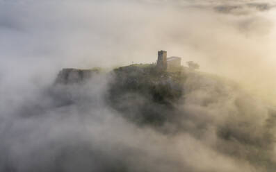 Brentor Church surrounded by morning mist in autumn, Dartmoor, Devon, England, United Kingdom, Europe - RHPLF24591