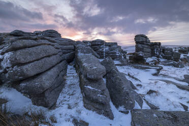 Sunrise over a snow covered East Mill Tor in winter, Dartmoor, Devon, England, United Kingdom, Europe - RHPLF24639