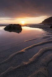 Beautiful sunset on a deserted Holywell Beach, Cornwall, England, United Kingdom, Europe - RHPLF24648