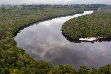 Aerial of the black Pasimoni River, in the deep south of Venezuela, South America - RHPLF24727