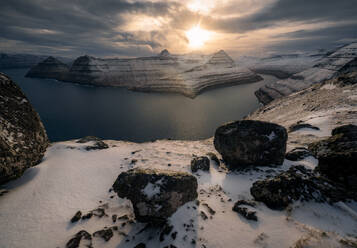 Snowy mountains in a remote fjord in winter, Faroe Islands, Denmark, Atlantic, Europe - RHPLF24806