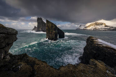 The Arch of Drangarnir in the middle of Atlantic Ocean, the epic landscape of Faroe Islands, Denmark, Atlantic, Europe - RHPLF24807