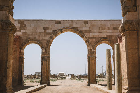 Qasr al-Mushatta desert castle facade with arches, Jordan, Middle East - RHPLF24840