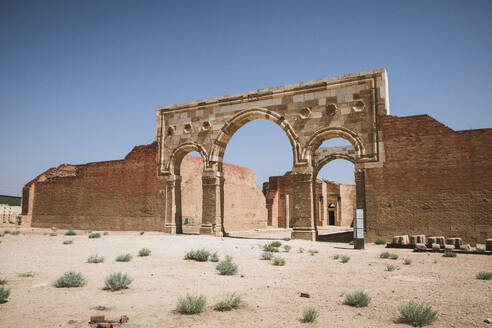 Qasr al-Mushatta desert castle facade with arches, Jordan, Middle East - RHPLF24841
