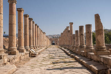 Ancient Roman stone road with a colonnade, Jerash, Jordan, Middle East - RHPLF24861