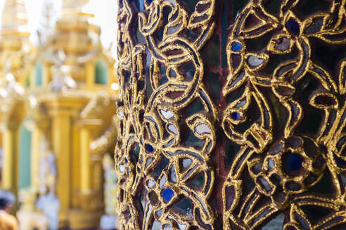 Detail of decorated column inside temple, Shwedagon Pagoda complex, Yangon, Myanmar (Burma), Asia - RHPLF24885