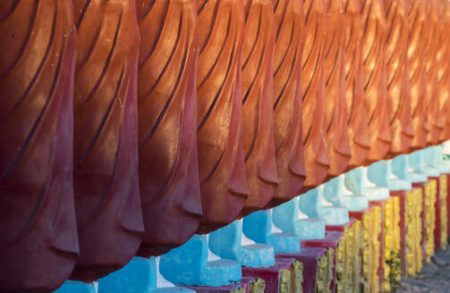 Close-up of monk sculptures standing in line at Myo Yar Pyae Pagoda, Monywa, Myanmar (Burma), Asia - RHPLF24896