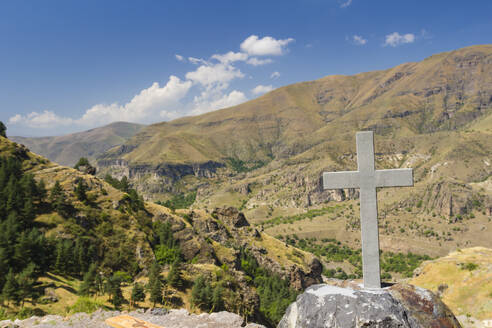 Cross made of stone at church built on in the rock in Vanis Kvabebi Monastery near Vardzia, Aspindza, Samtskhe-Javakheti, Georgia, Central Asia, Asia - RHPLF24930