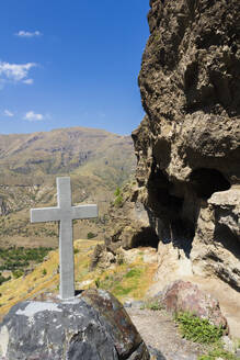 Cross made of stone at church built on in the rock in Vanis Kvabebi Monastery near Vardzia, Aspindza, Samtskhe-Javakheti, Georgia, Central Asia, Asia - RHPLF24940