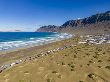 Aerial view of beach of Playa Famara, Caleta de Famara, Lanzarote, Las Palmas, Canary Islands, Spain, Atlantic, Europe - RHPLF25044