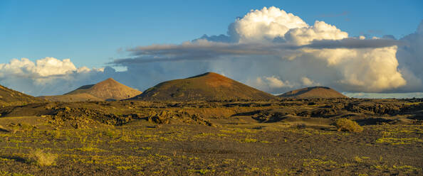 View of volcanic landscape in Timanfaya National Park at sunset, Lanzarote, Las Palmas, Canary Islands, Spain, Atlantic, Europe - RHPLF25069