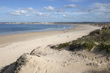 Praia de Peniche de Cima beach backed by sand dunes and popular with surfers, Peniche, Centro Region, Estremadura, Portugal, Europe - RHPLF25079