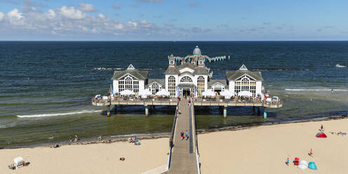 Pier and beach chairs on the beach of Sellin, Ruegen Island, Baltic Sea, Mecklenburg-Western Pomerania, Germany, Europe - RHPLF25091