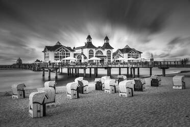 Pier and beach chairs on the beach of Sellin, Ruegen Island, Baltic Sea, Mecklenburg-Western Pomerania, Germany, Europe - RHPLF25094