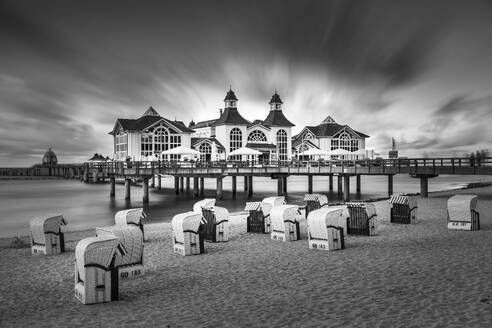 Pier and beach chairs on the beach of Sellin, Ruegen Island, Baltic Sea, Mecklenburg-Western Pomerania, Germany, Europe - RHPLF25094