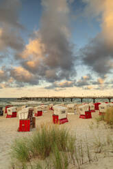 Beach chairs and pier on the beach of Bansin, Usedom Island, Baltic Sea, Mecklenburg-Western Pomerania, Germany, Europe - RHPLF25096