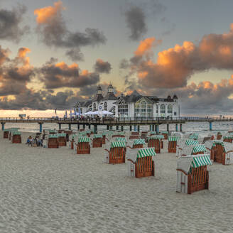 Pier and beach chairs on the beach of Sellin, Ruegen Island, Baltic Sea, Mecklenburg-Western Pomerania, Germany, Europe - RHPLF25099