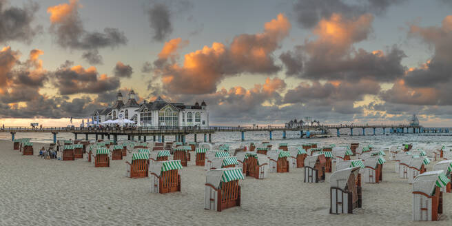 Pier and beach chairs on the beach of Sellin, Ruegen Island, Baltic Sea, Mecklenburg-Western Pomerania, Germany, Europe - RHPLF25104