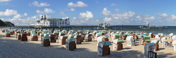 Pier and beach chairs on the beach of Sellin, Ruegen Island, Baltic Sea, Mecklenburg-Western Pomerania, Germany, Europe - RHPLF25106