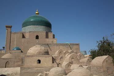 Tombs in the foreground, Timurid-style Dome, Pakhlavon Mahmud Mausoleum, Ichon Qala (Itchan Kala), UNESCO World Heritage Site, Khiva, Uzbekistan, Central Asia, Asia - RHPLF25178