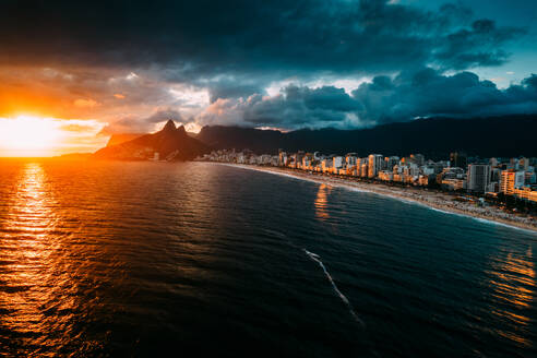 Aerial drone view of Ipanema and Leblon beaches at sunset, Rio de Janeiro, Brazil, South America - RHPLF25253