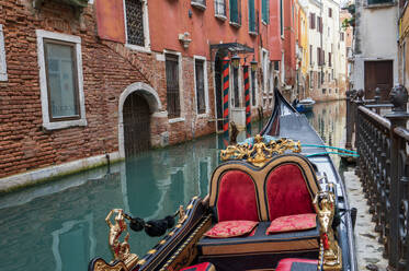 Venetian gondola moored on a canal, Venice, UNESCO World Heritage Site, Veneto, Italy, Europe - RHPLF25272
