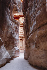 Petra Treasury (El Khazneh) monument revealed at the end of the Siq canyon, Petra, UNESCO World Heritage Site, Jordan, Middle East - RHPLF25296