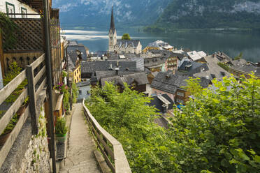 Elevated view of Hallstatt city center dominated by Evangelisches Pfarramt church, Hallstatt, UNESCO World Heritage Site, Austria, Europe - RHPLF25299