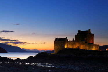 Eilean Donan Castle at dusk, Loch Duich, Highland Region, Scotland, United Kingdom, Europe - RHPLF25360