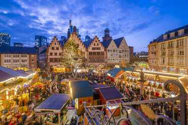 View of Christmas Market on Roemerberg Square from elevated position at dusk, Frankfurt am Main, Hesse, Germany, Europe - RHPLF25386