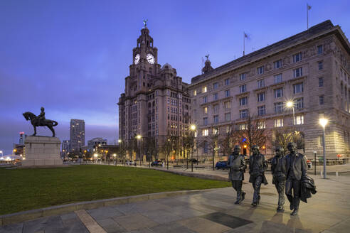 The Beatles Statue and Royal Liver Building at night, Pier Head, Liverpool Waterfront, Liverpool, Merseyside, England, United Kingdom, Europe - RHPLF25458