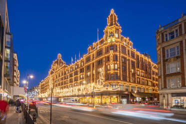 View of Harrods department store illuminated at dusk, Knightsbridge, London, England, United Kingdom, Europe - RHPLF25514