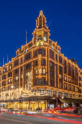 View of Harrods department store illuminated at dusk, Knightsbridge, London, England, United Kingdom, Europe - RHPLF25515